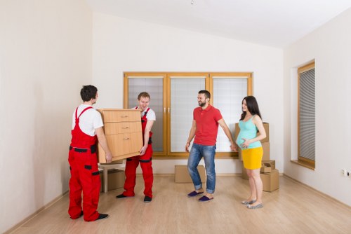 Organized storage space in Hithergreen with labeled boxes and furniture